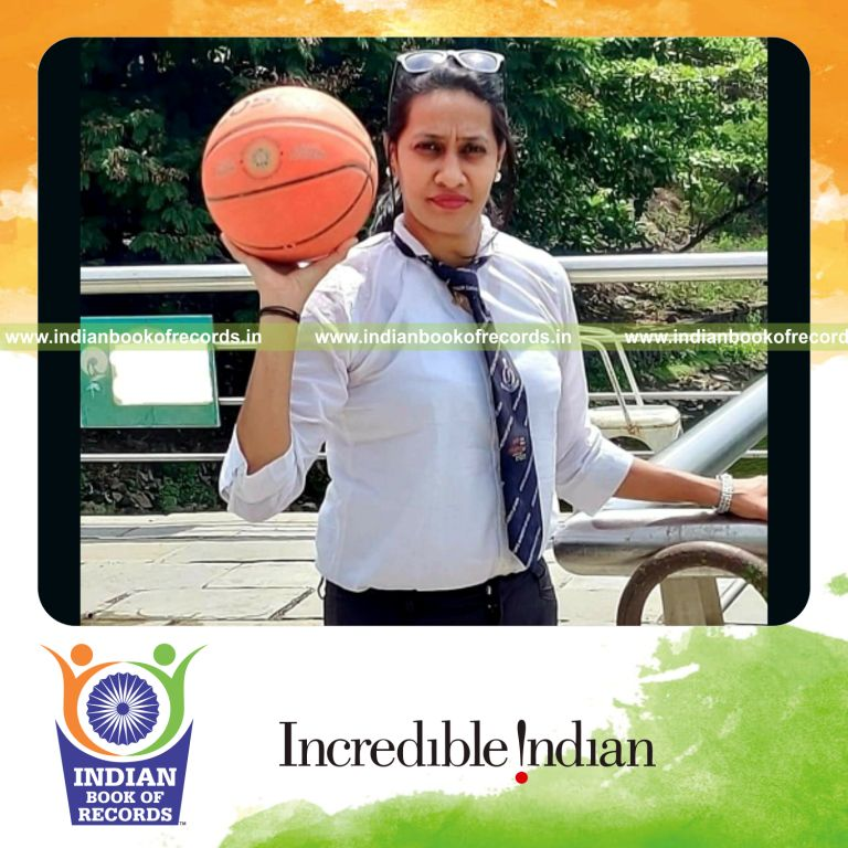 Woman making a long-distance single-handed basketball shot recognized by Indian Book of Records
