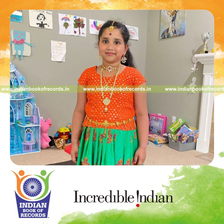 Young girl simultaneously reciting and performing Bharatanatyam hasta angas at high speed recognized by Indian Book of Records