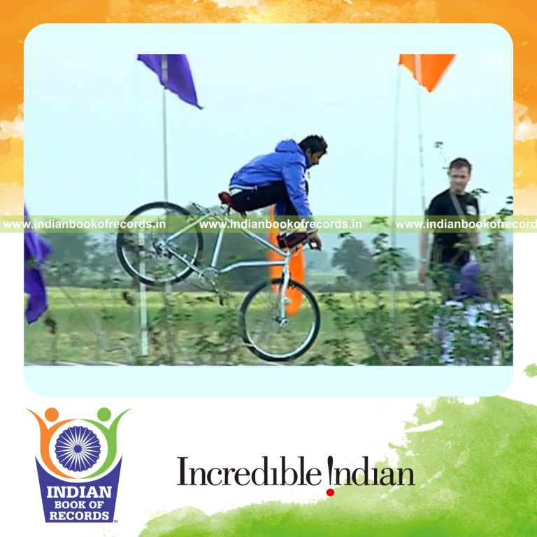 longest bicycle stoppie performed with feet on handlebars for Indian Book of Records