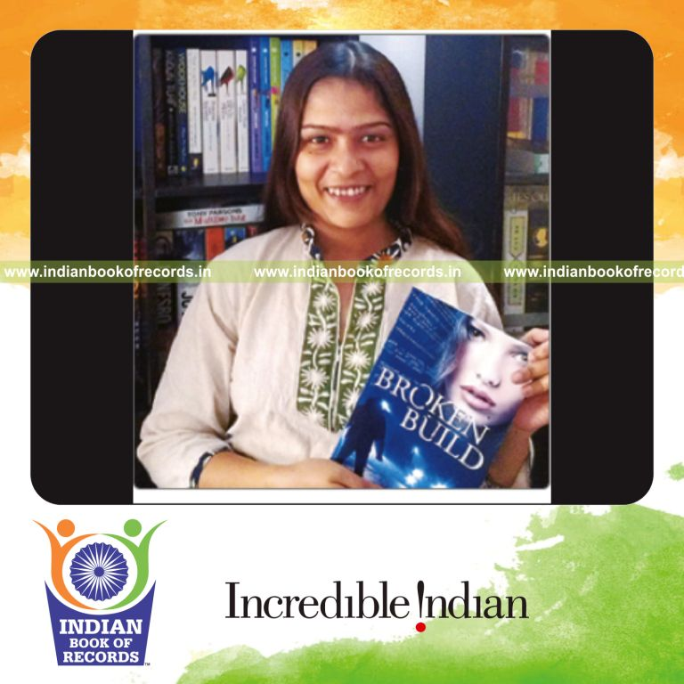female reviewing maximum number of books for Indian Book of Records