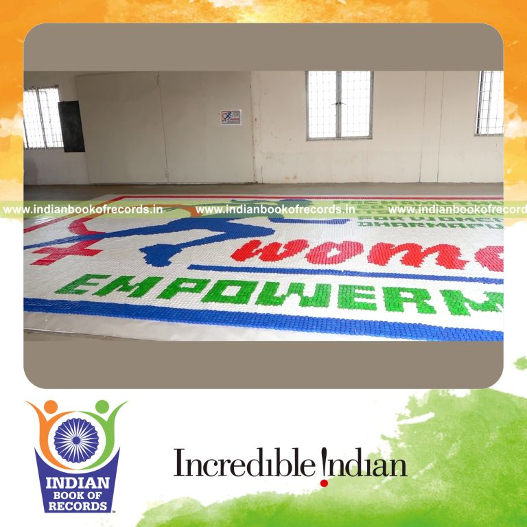 team creating large mosaic using bottle caps for Indian Book of Records