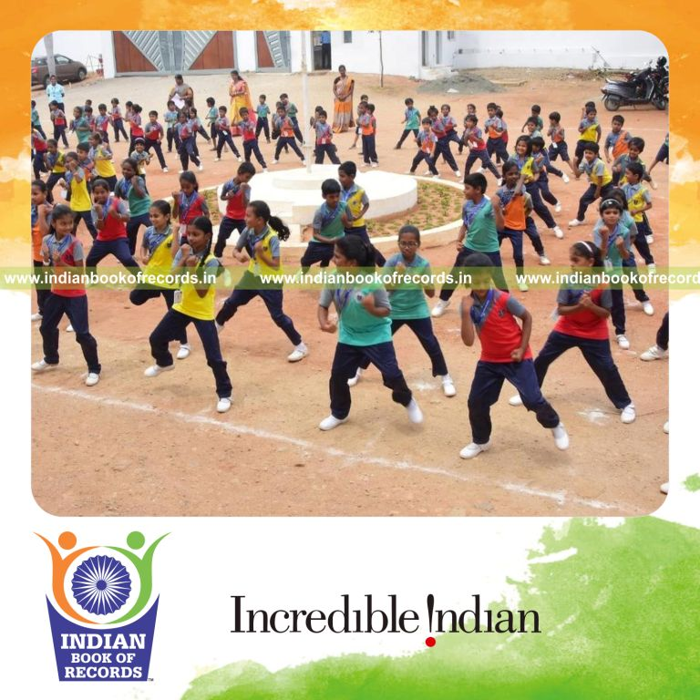 Large group performing the chicken dance together at one venue for Indian Book of Records