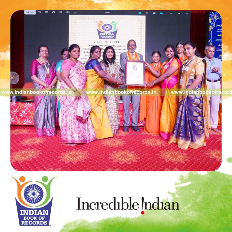 A group engaged in uninterrupted seed ball preparation at one venue recognized by Indian Book of Records