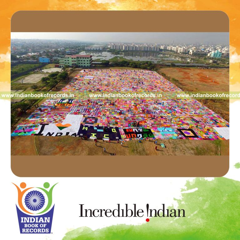 team creating large crochet blanket for Indian Book of Records