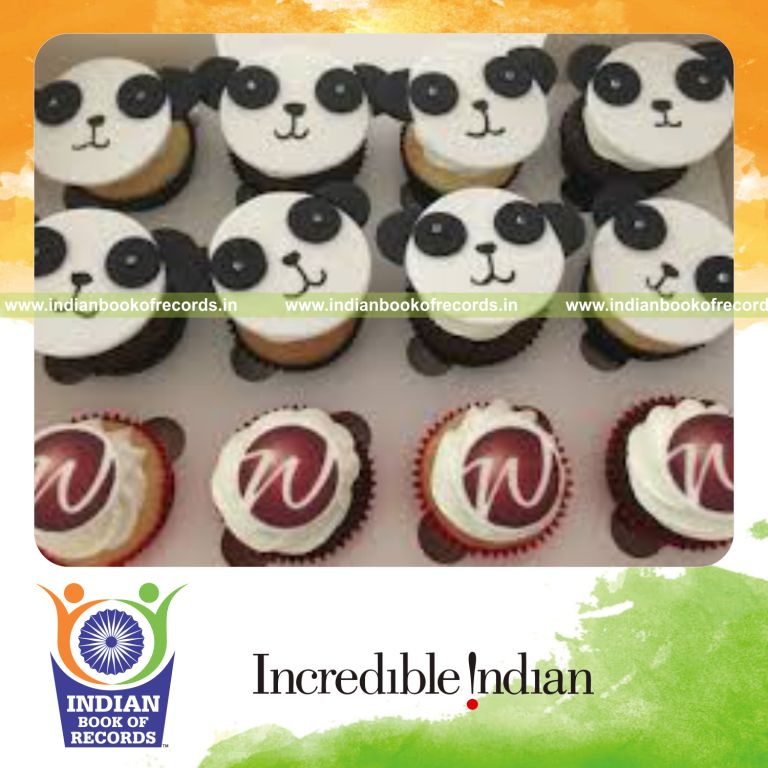 team preparing large number of cupcakes for Indian Book of Records