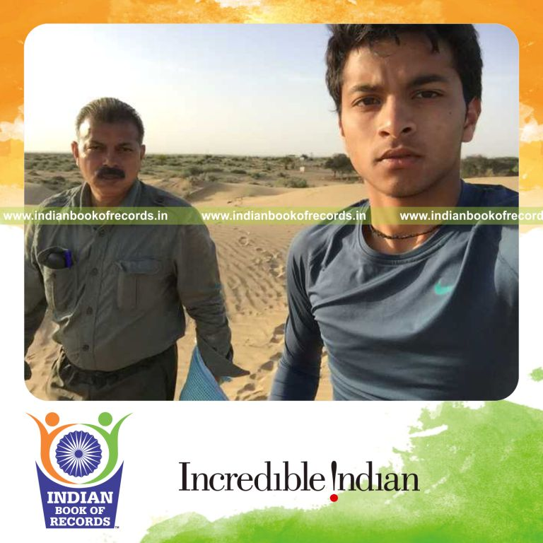 father and son trekking long distance in desert for Indian Book of Records