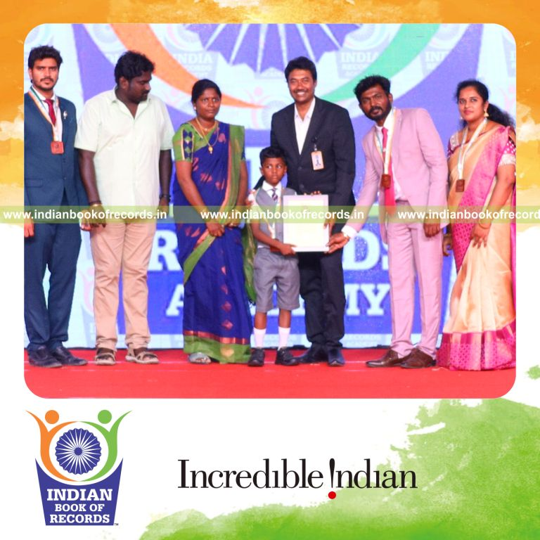 Individual completing numerous dot to dot drawings within one hour for Indian Book of Records
