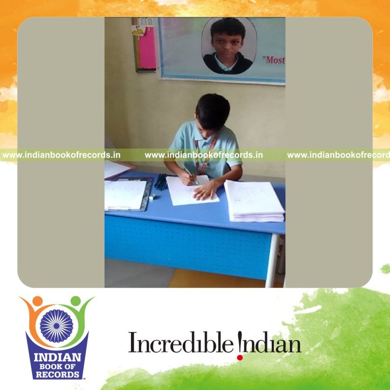 Young boy completing numerous dot-to-dot drawings within two hours recognized by Indian Book of Records