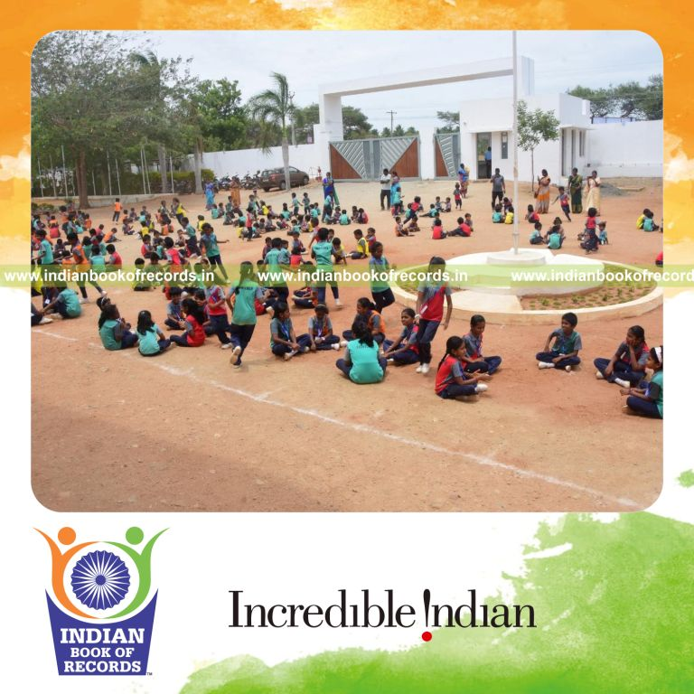 Crowd participating in the duck duck goose game simultaneously at a single venue for Indian Book of Records