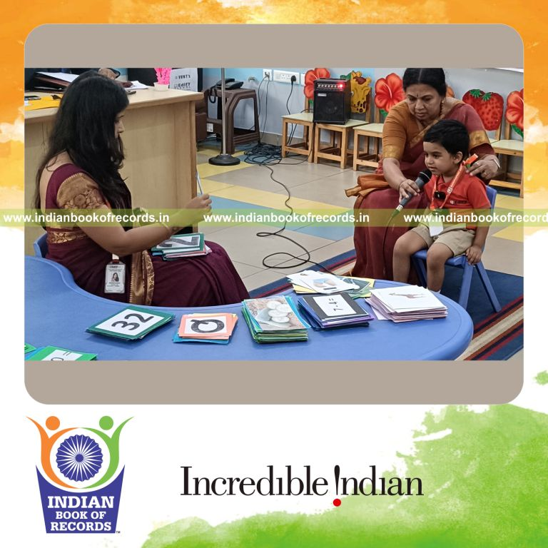 Preschool child recalling and reciting early learning facts upon prompts recognized by Indian Book of Records