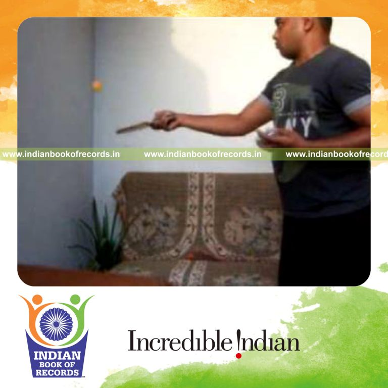 individual performing pre cmc cuts while bouncing ball on wall for record in Indian Book of Records