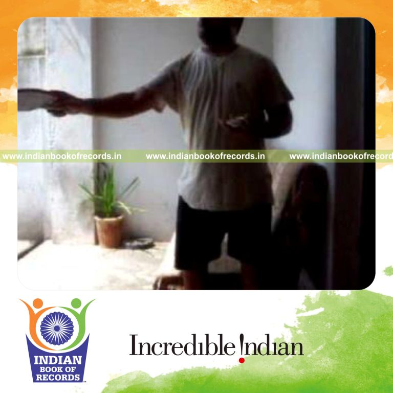 individual performing sabers flipper cuts while bouncing ball on alternate paddle sides for record in Indian Book of Records