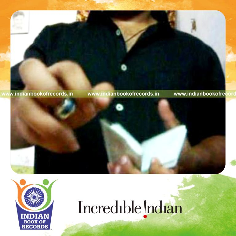 individual performing thumb cuts while doing gryphon rolls for record in Indian Book of Records
