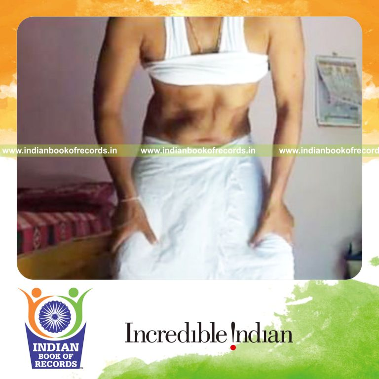 individual performing 200 stomach rolls for record in Indian Book of Records