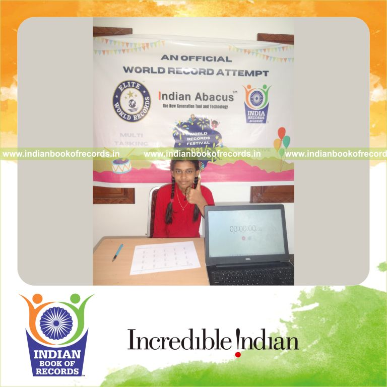individual female solving three digit addition and subtraction problems for Indian Book of Records