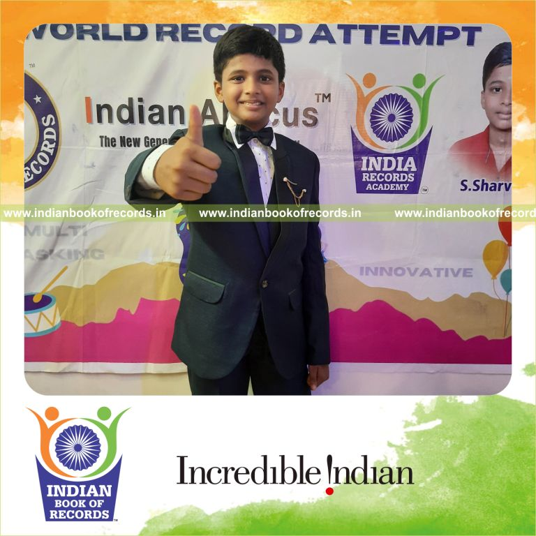 individual male solving addition problems using abacus for Indian Book of Records