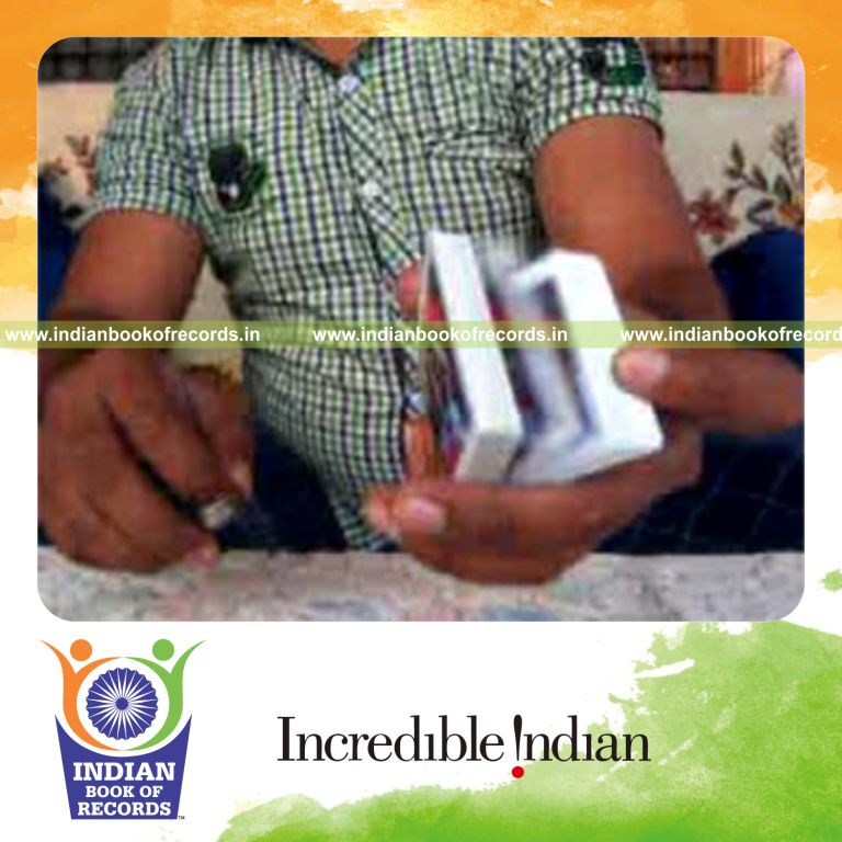 individual performing charlier and cox uker cuts while doing gryphon rolls for record in Indian Book of Records