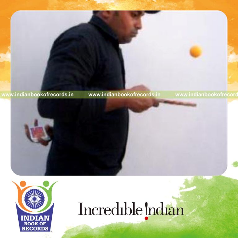 individual performing charlier and sabers flipper cuts behind back while bouncing table tennis ball for record in Indian Book of Records