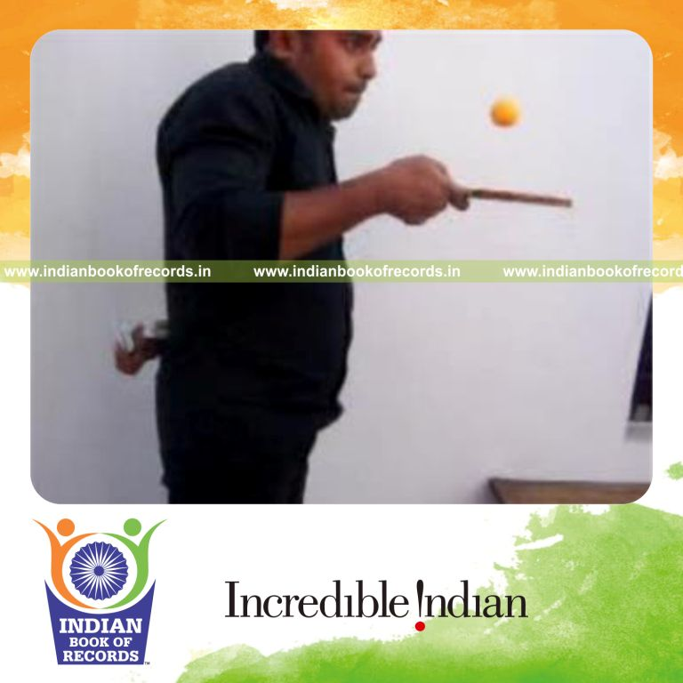 individual performing charlier and kryptonite cuts behind back while bouncing table tennis ball for record in Indian Book of Records