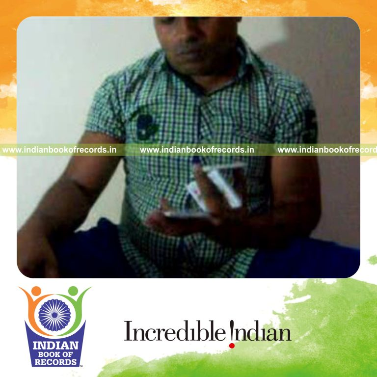 individual performing charlier and kryptonite card cuts quickly for record in Indian Book of Records