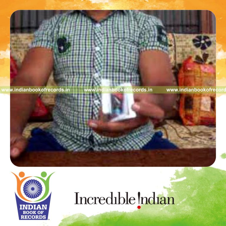 individual performing charlier and reverse scissor cuts quickly for record in Indian Book of Records