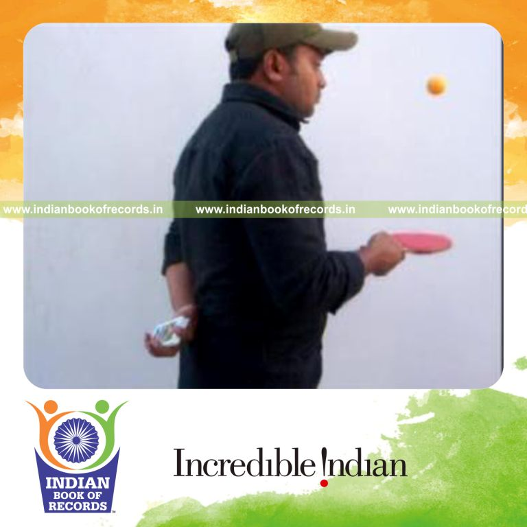 individual performing charlier and revo flipped cuts behind back while bouncing table tennis ball for record in Indian Book of Records