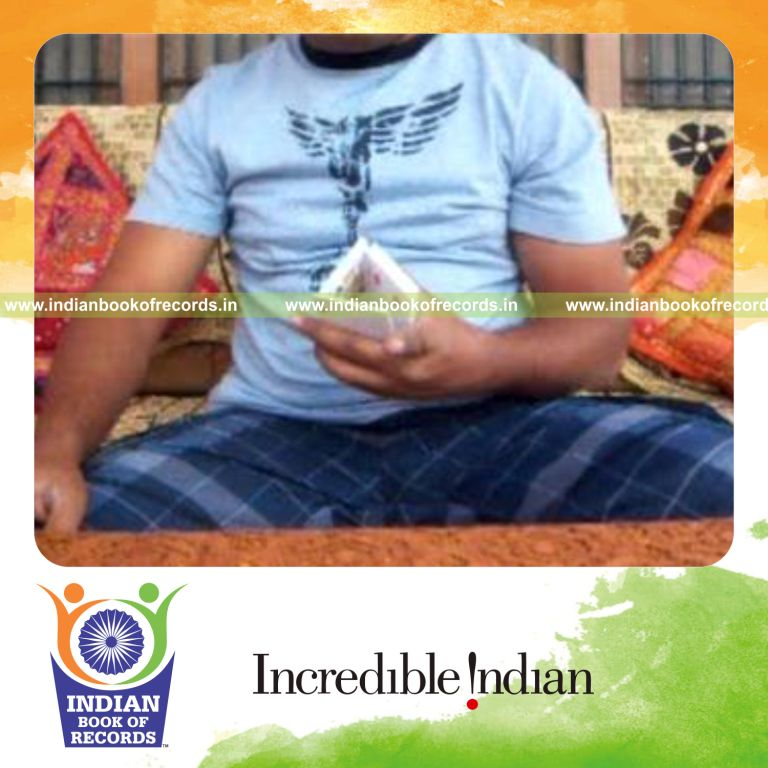 individual performing charlier and triangle card cuts quickly for record in Indian Book of Records