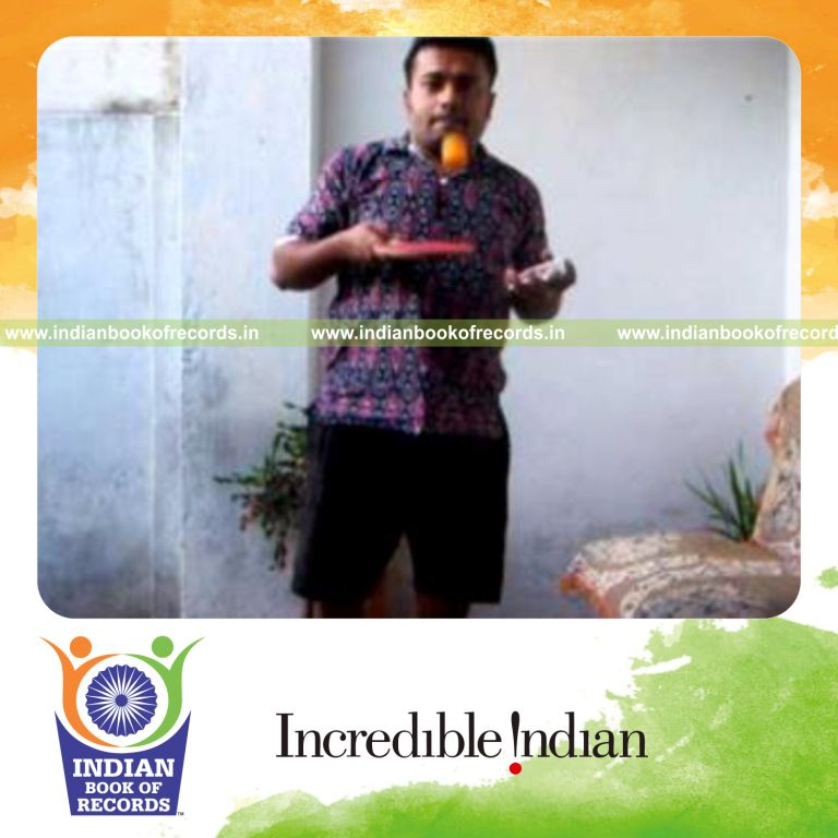 individual performing fastest k town flip card cut while bouncing ball for record in Indian Book of Records