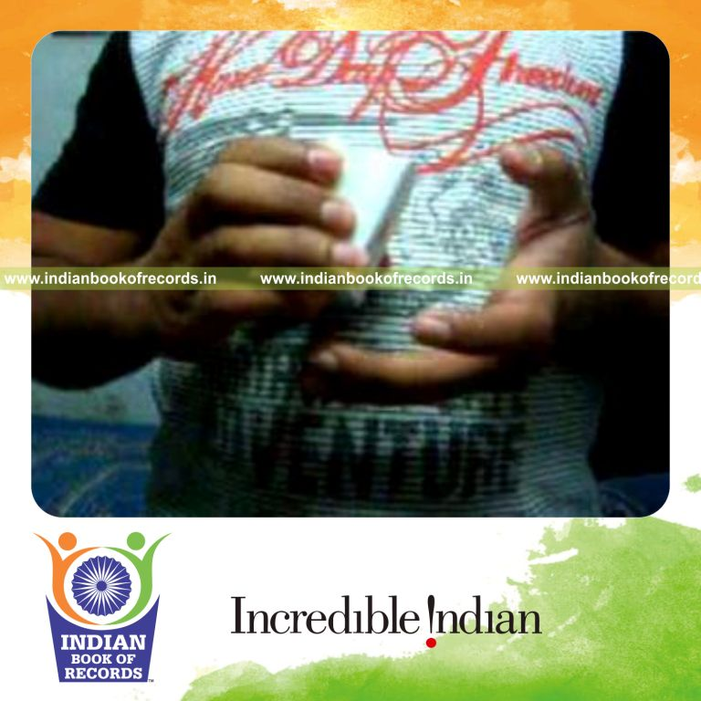 individual performing fastest keo kut card cut using double deck for record in Indian Book of Records