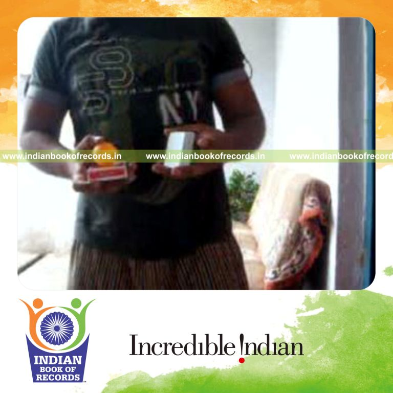 individual performing muse card cut while bouncing ball on deck for record in Indian Book of Records