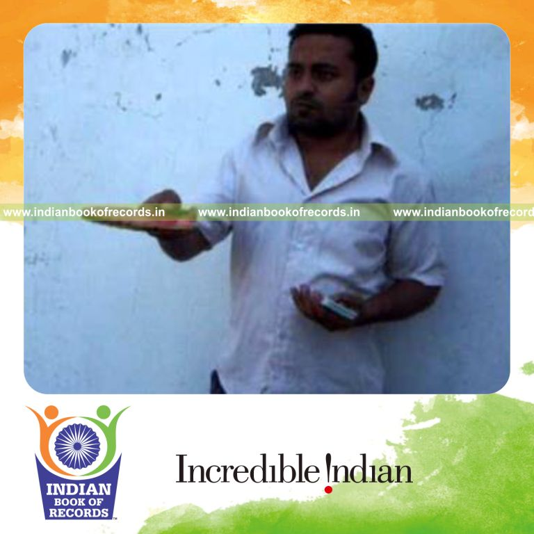 individual performing fastest pre cmc card cut while bouncing ball for record in Indian Book of Records