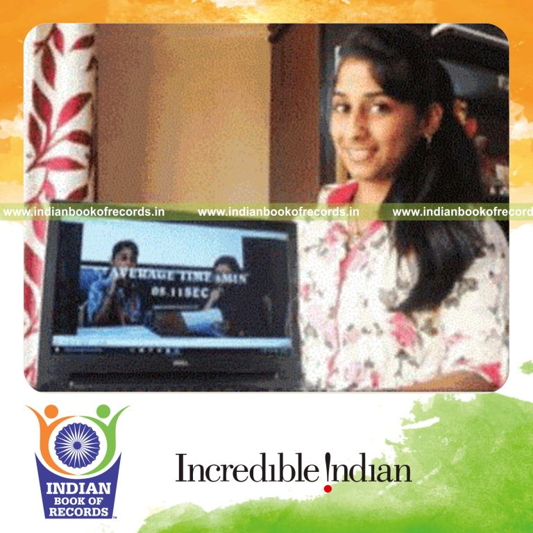 minor female performing reverse spelling quickly for Indian Book of Records
