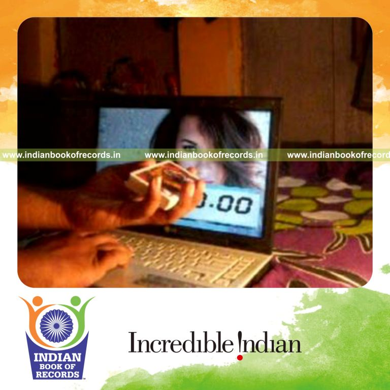 individual performing fastest revolution card cut for record in Indian Book of Records