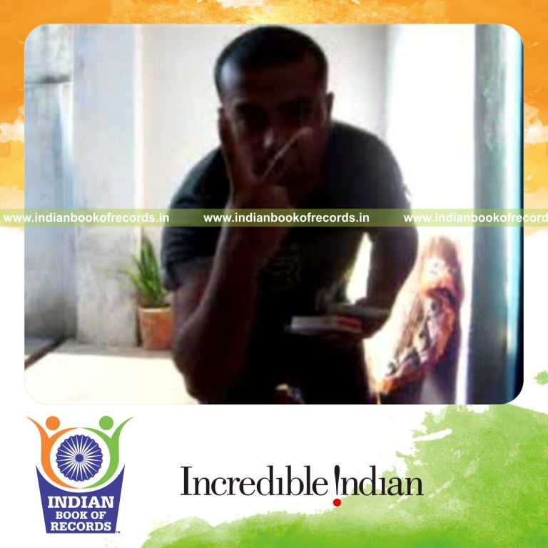 individual performing roll card cut while bouncing ball on deck for record in Indian Book of Records