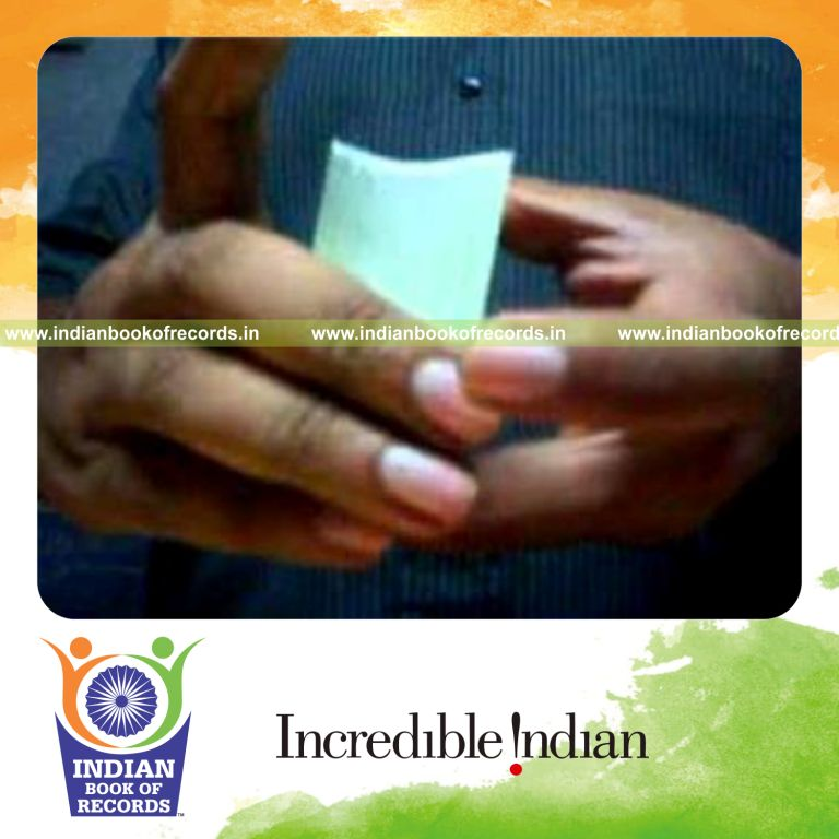 individual performing sabers half drop card cut using double deck for record in Indian Book of Records