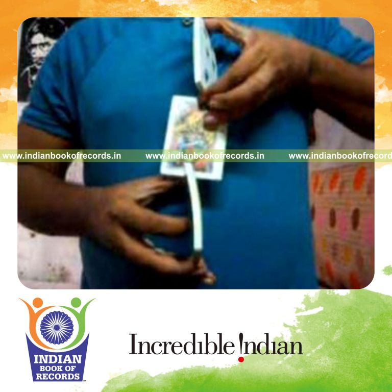 individual performing sabers tower card display for record in Indian Book of Records