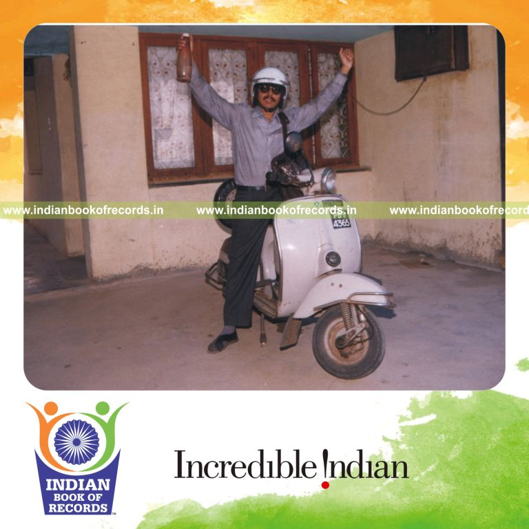 male individual riding scooter at high speed on highway for record in Indian Book of Records