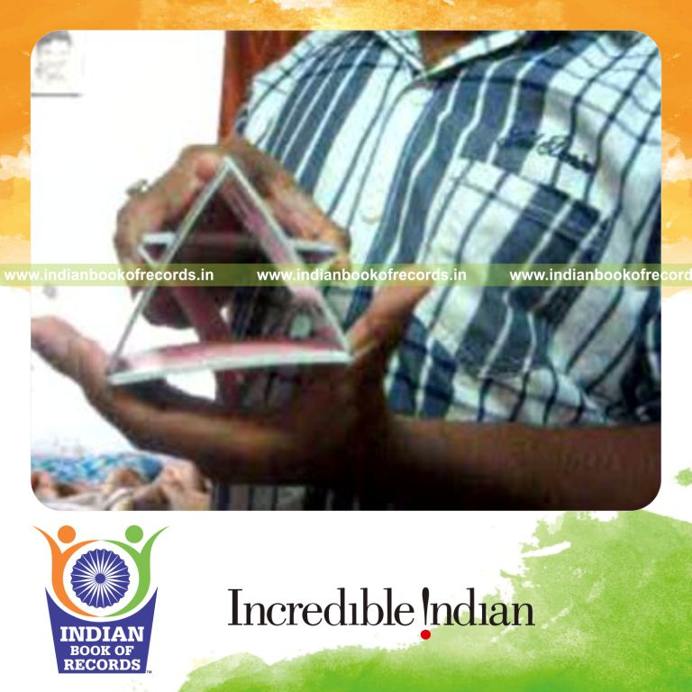 individual performing fastest star playing card display for record in Indian Book of Records