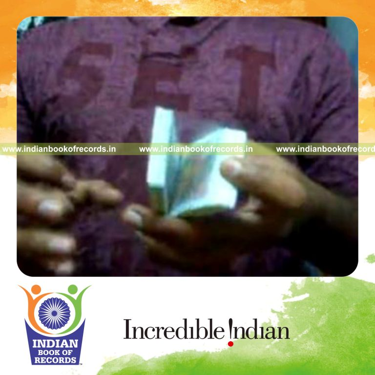 individual performing tctcsa card cut for record in Indian Book of Records