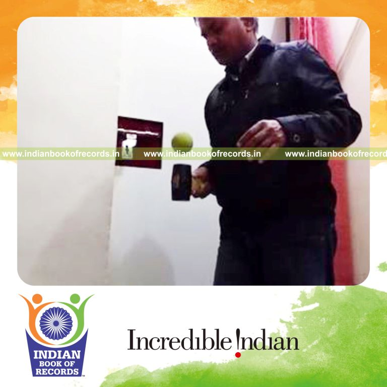 individual bouncing tennis ball 100 times on rubber mallet in fastest time for record in Indian Book of Records