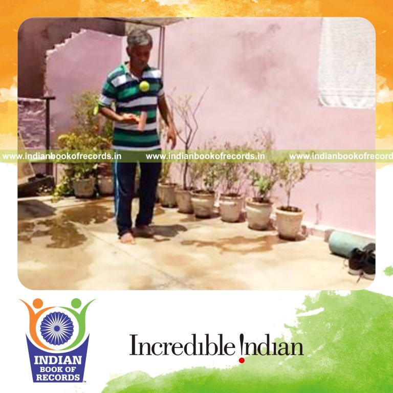 individual bouncing tennis ball 100 times on wooden mallet in fastest time for record in Indian Book of Records