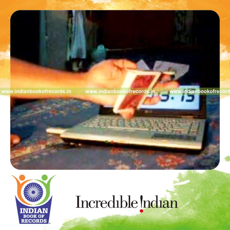 individual performing fastest muse card cut for record in Indian Book of Records