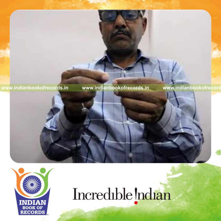 individual threading needle by hand in fastest time for record in Indian Book of Records