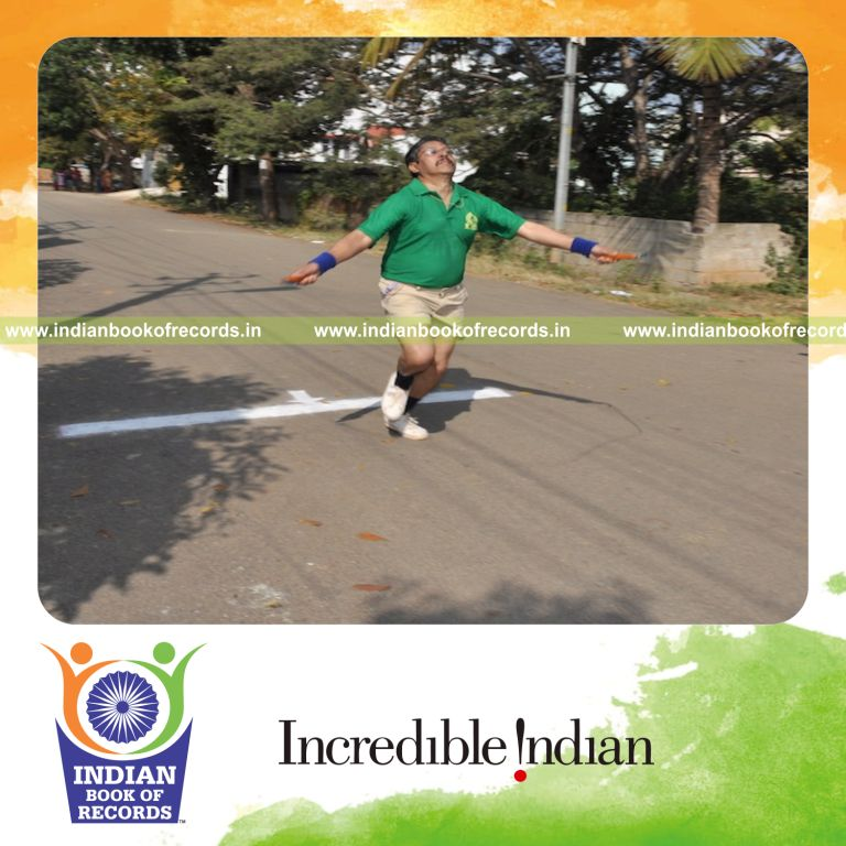 male individual running while skipping quickly for record in Indian Book of Records