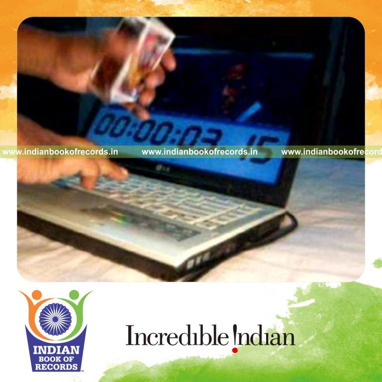 individual making triangle display using three playing cards at fastest time for record in Indian Book of Records