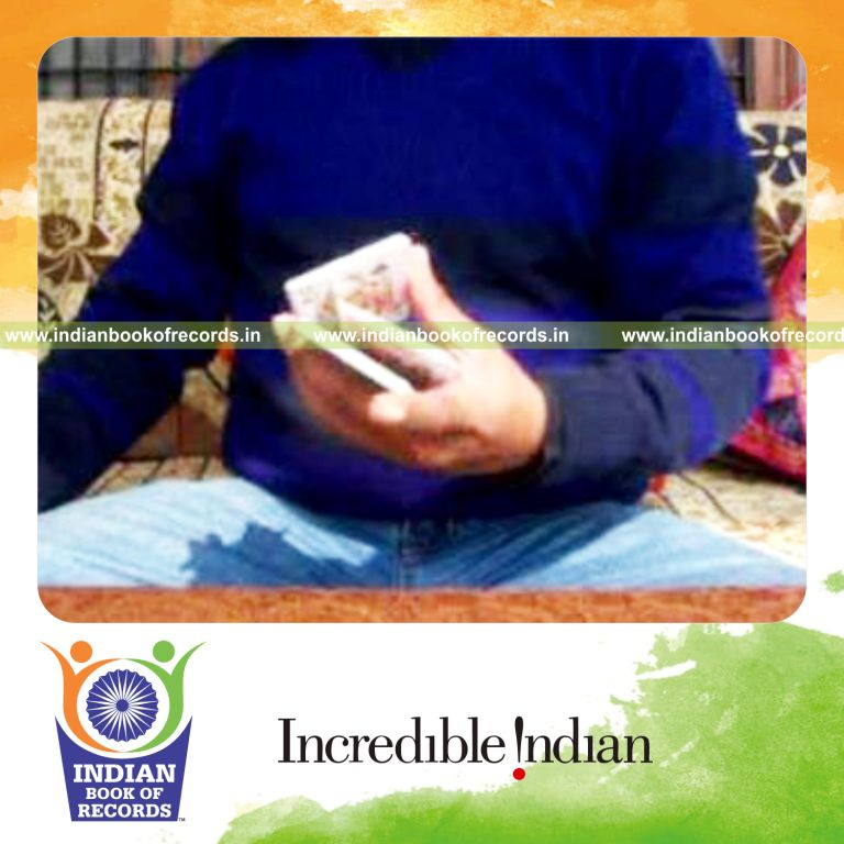 individual performing triple charlier and three packet thumb cuts quickly for record in Indian Book of Records