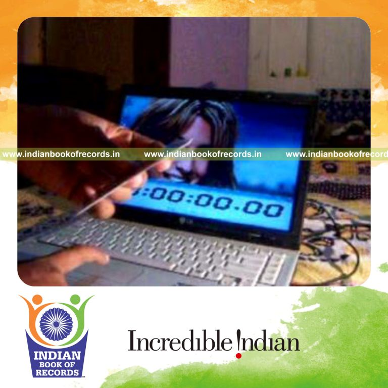 individual performing fastest triptych card cut using three playing cards for record in Indian Book of Records