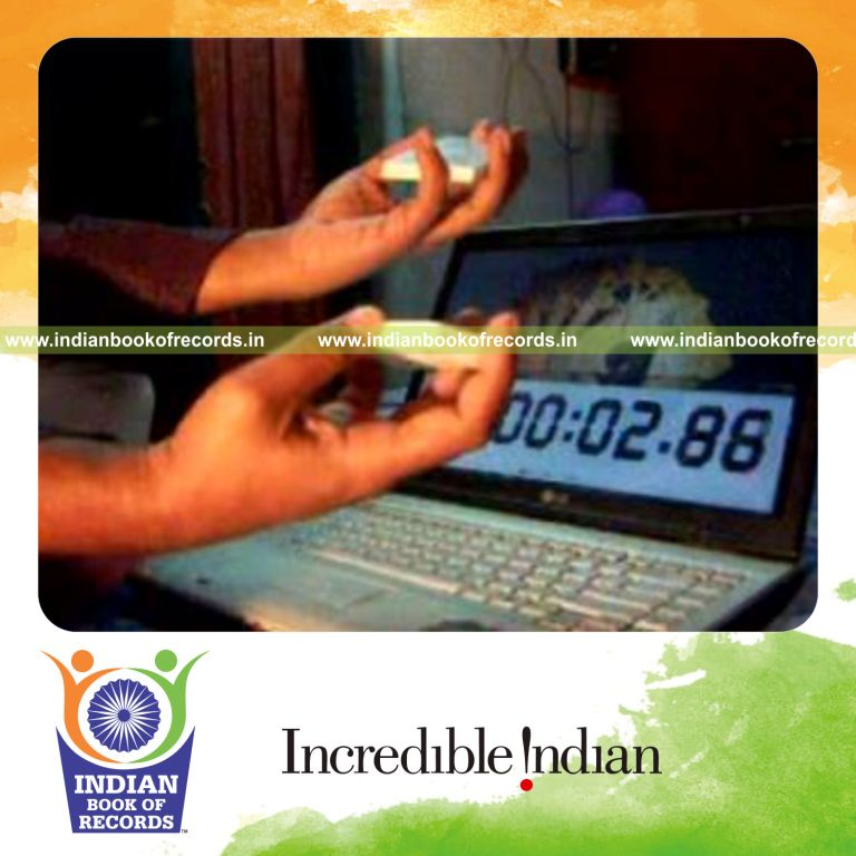 individual performing fastest two handed chen ka card cut for record in Indian Book of Records