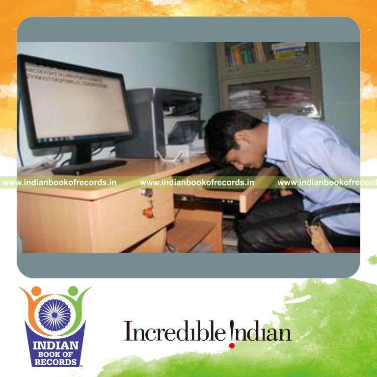 young boy typing alphabets using nose rapidly for Indian Book of Records
