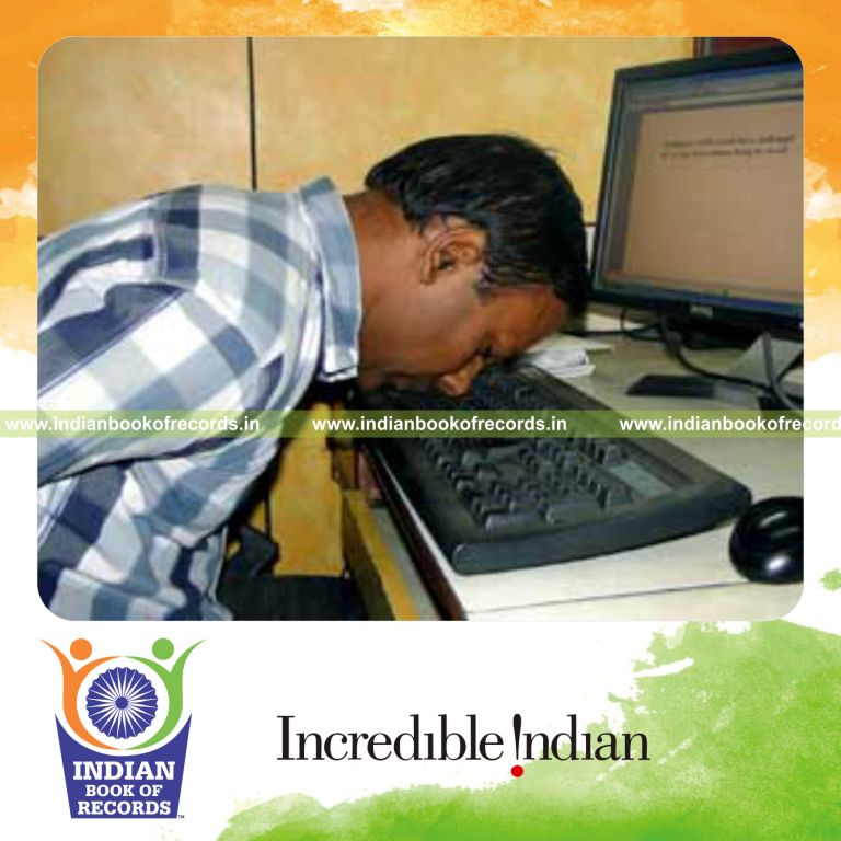 male typing characters using nose quickly for Indian Book of Records